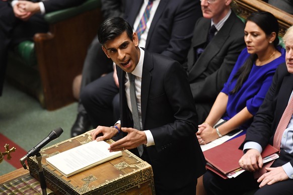 epa08287126 A handout photo made available by the UK Parliament shows Britain's Chancellor of the Exchequer Rishi Sunak during proceedings on the budget in the House of Commons in London, Britain, 11  ...