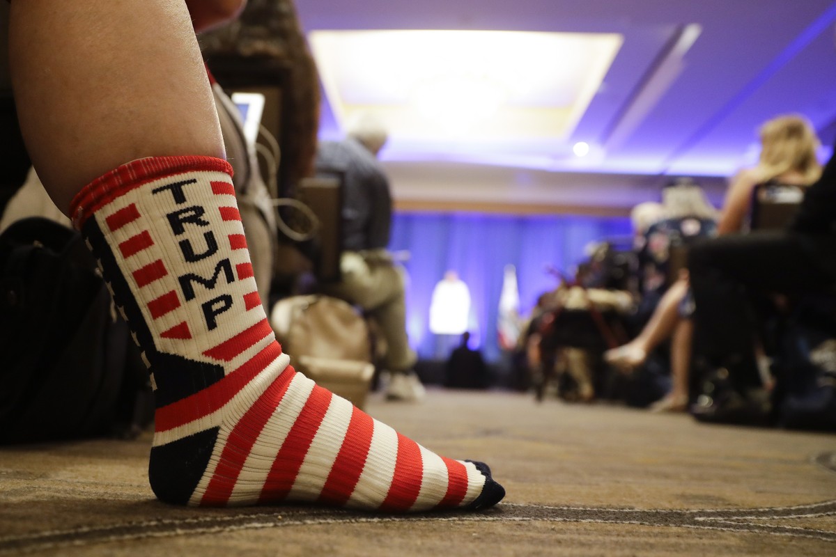 A Trump supporter listens as Brad Parscale, campaign manager for Trump's 2020 reelection campaign, speaks during the California GOP fall convention on Saturday, Sept. 7, 2019, in Indian Wells, Ca ...