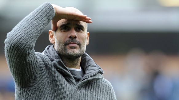 Manchester City manager Josep Guardiola leaves the pitch at the end of the English Premier League soccer match between Burnley and Manchester City at Turf Moor in Burnley, England, Sunday, April 28, 2 ...