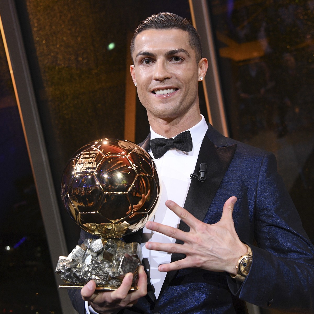 This image provided by L'Equipe Friday Dec.8, 2017 shows Portuguese soccer player Christiano Ronaldo holding the Ballon d' Or (Golden Ball) he received Thursday Dec.7, 2017 in Paris. A decad ...