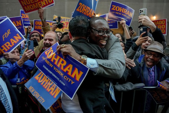 FILE - Democratic candidate Zohran Mamdani, left, is greeted by supporters upon arriving for a mayoral debate in New York, Oct. 16, 2025. (AP Photo/Angelina Katsanis, File)
AP Top Photos of the Month  ...