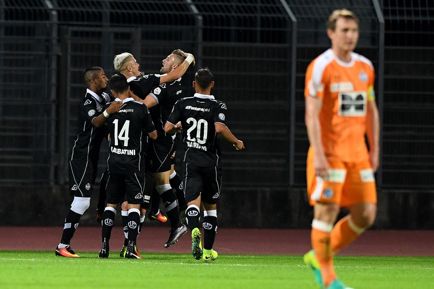 Lugano&#039;s players celebrate the 1-0 goal, during the Super League soccer match FC Lugano against FC Grasshopper Club Zurich, at the Cornaredo stadium in Lugano, Thursday, September 22, 2016. (KEYS ...