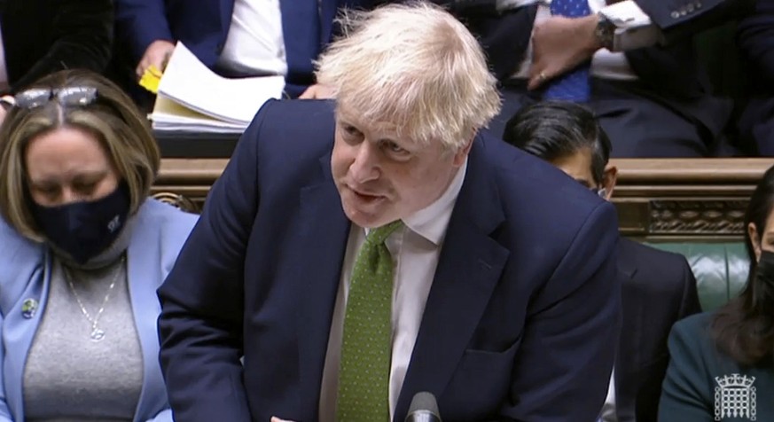 In this screen shot taken from video, Britain&#039;s Prime Minister Boris Johnson speaks during Prime Minister&#039;s Questions in the House of Commons, London, Wednesday, Jan. 19, 2022. Johnson faced ...