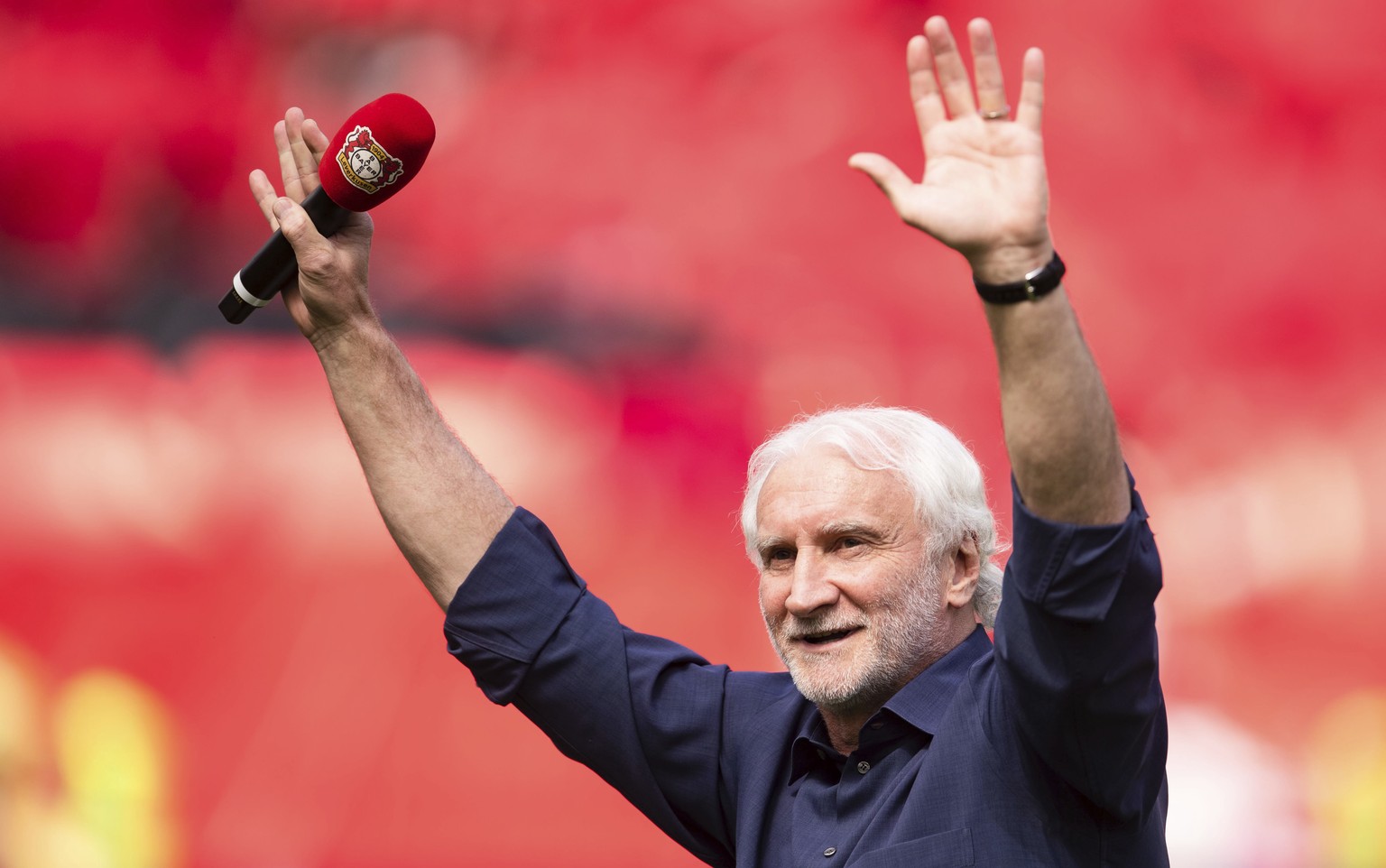 Rudi Voeller, Leverkusen&#039;s managing director of sport, bids farewell before the match between Bayer Leverkusen and SC Freiburg in Leverkusen, Germany, Saturday, May 14, 2022. Voeller is retiring  ...