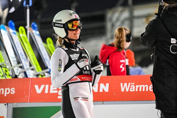 epa10541112 Maren Lundby of Norway reacts in the finish area during the final round of the Women&#039;s HS130 competition at the FIS Ski Jumping World Cup in Lahti, Finland, 24 March 2023. EPA/KIMMO B ...
