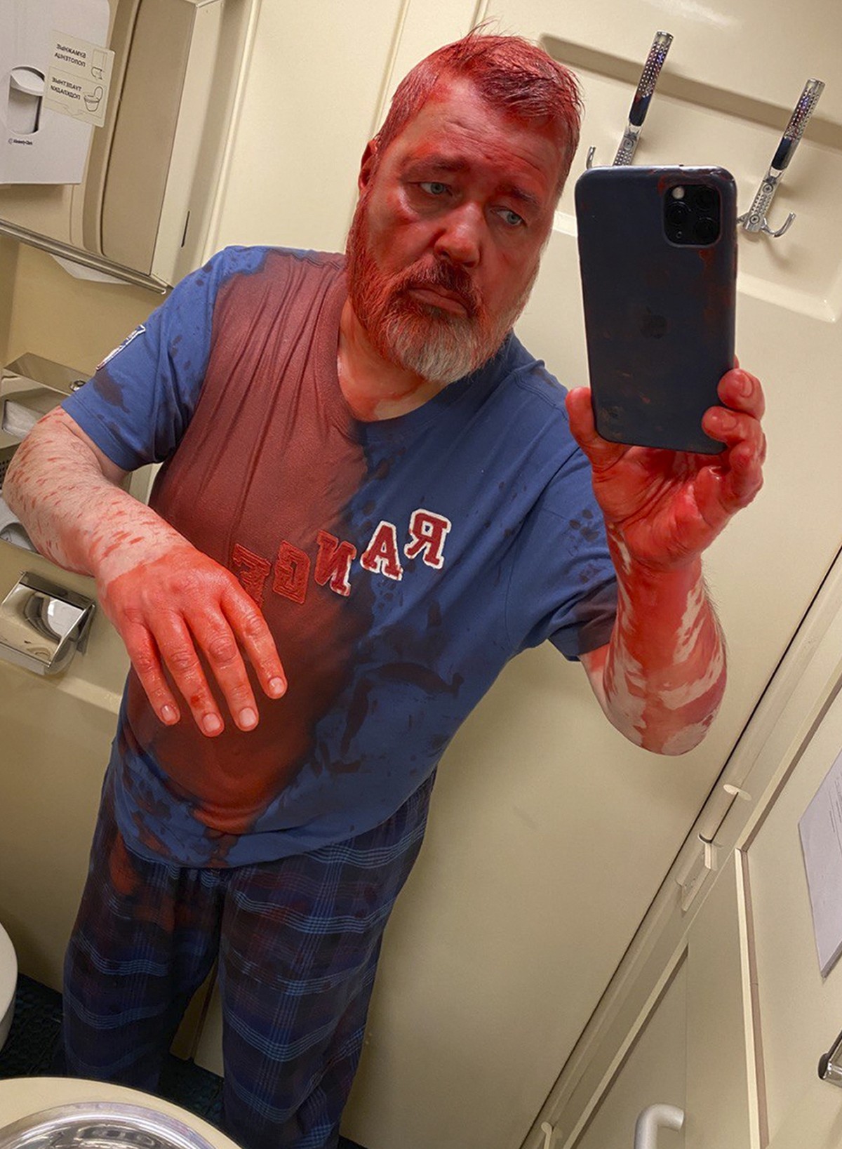 In this photo published on Novaya Gazeta Europe's Telegram channel, Nobel Peace Prize-winning newspaper editor Dmitry Muratov takes a selfie after he said he was attacked on a Russian train by an ...