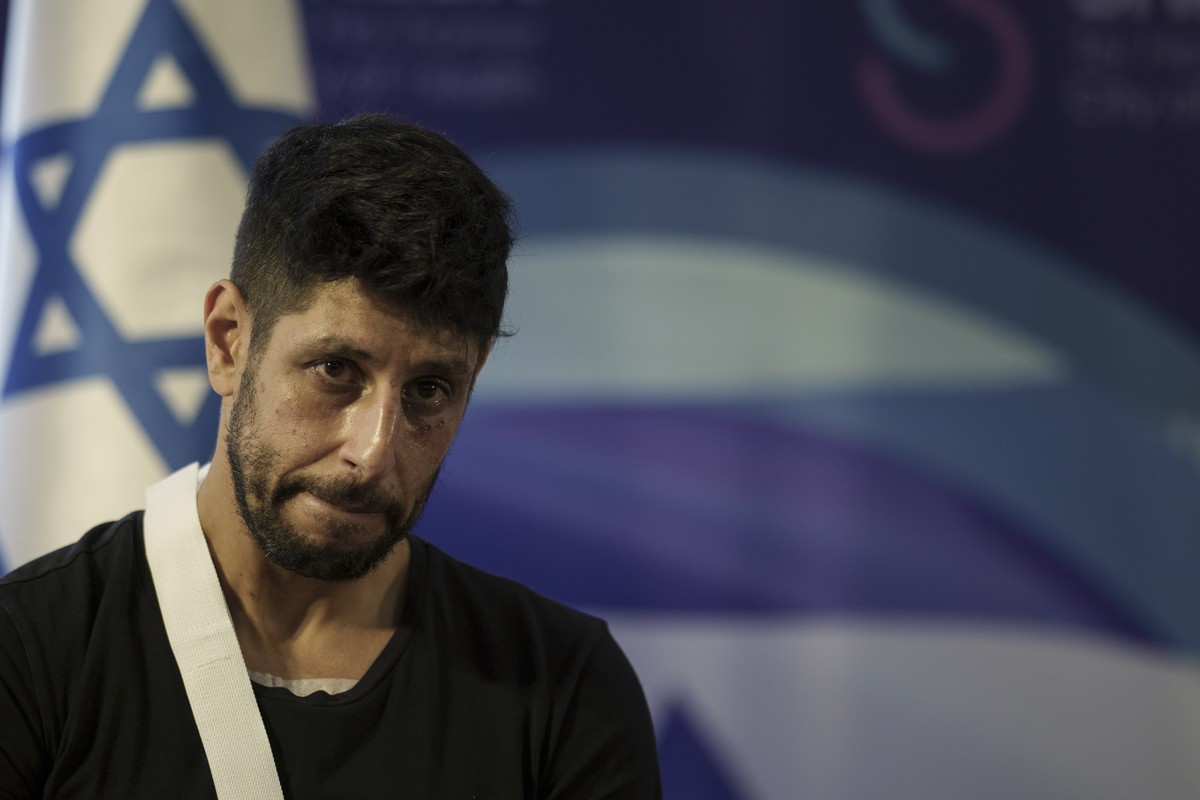 The actor Idan Amedi, well known for his role in the Netflix series "Fauda", listens to a question during a press conference at the Sheba Medical Center in Ramat Gan, Israel, Thursday, Jan.  ...