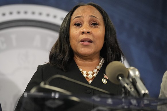 Fulton County District Attorney Fani Willis speaks in the Fulton County Government Center during a news conference, Monday, Aug. 14, 2023, in Atlanta. Donald Trump and several allies have been indicte ...