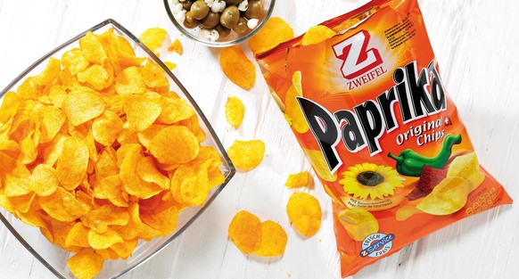 Seit 1964 die beliebtesten Chips im Sortiment: Zweifel Original Paprika Chips. Les meilleurs chips dans l&#039;assortiment depuis 1964: Zweifel Original Paprika Chips. Copyright: ARD Design Switzerlan ...