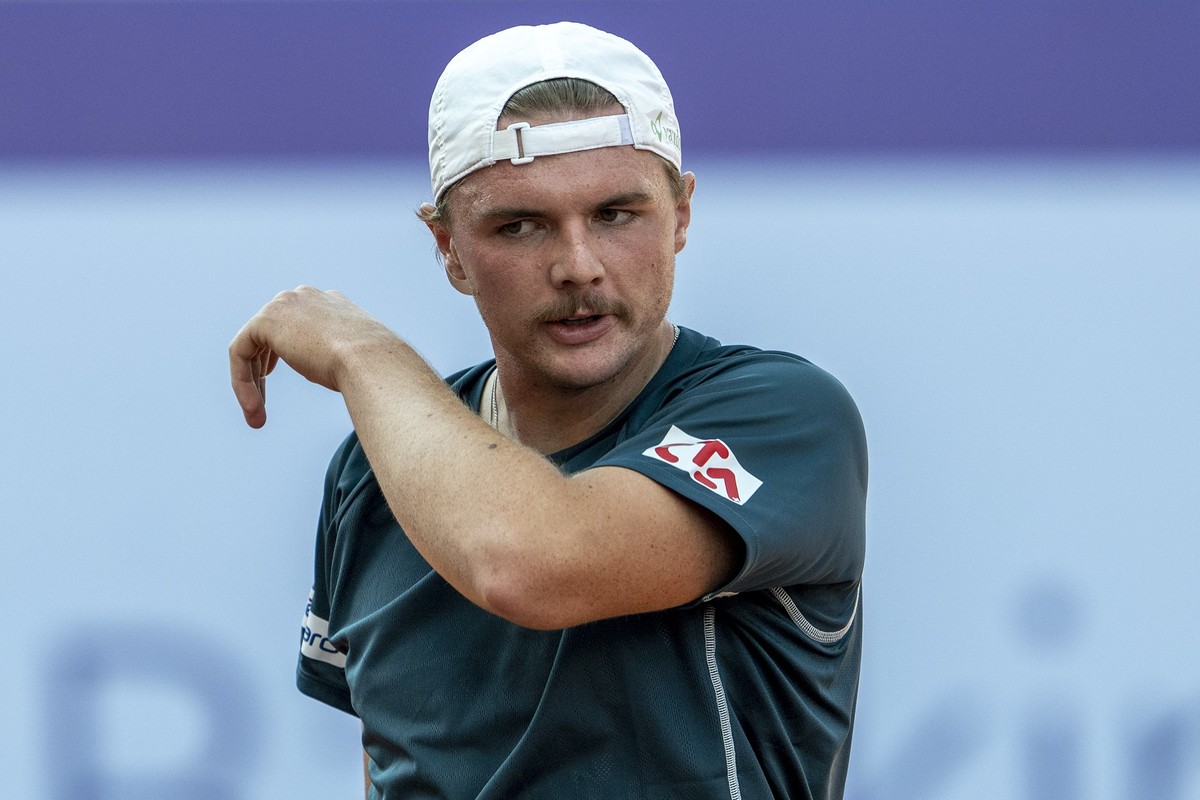 Dominic Stricker of Switzerland reacts to Pierre Hugues Herbert of France at the Swiss Open tennis tournament in Gstaad, Switzerland, on Monday, July 14, 2025. (KEYSTONE/Peter Schneider)