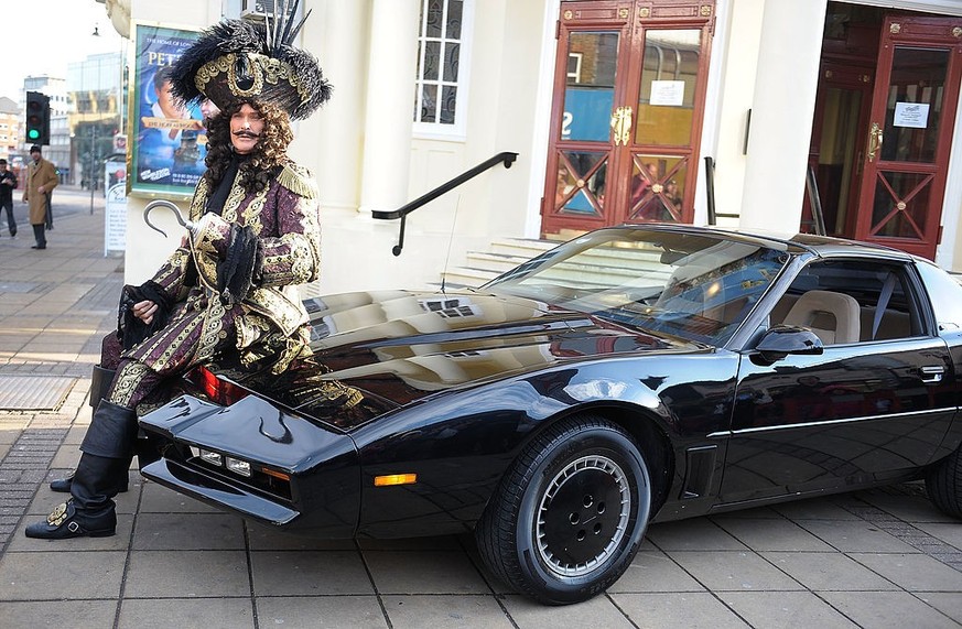 WIMBLEDON, ENGLAND - DECEMBER 09: David Hasselhoffb poses alongside KITT car to launch the Peter Pan pantomime at New Wimbledon Theatre on December 9, 2010 in Wimbledon, England. (Photo by Ferdaus Sha ...