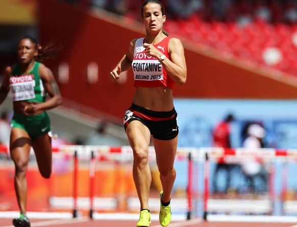 epa04893826 Petra Fontanive of Switzerland competes in the women&#039;s 400m Hurdles round 1 during the Beijing 2015 IAAF World Championships at the National Stadium, also known as Bird&#039;s Nest, i ...