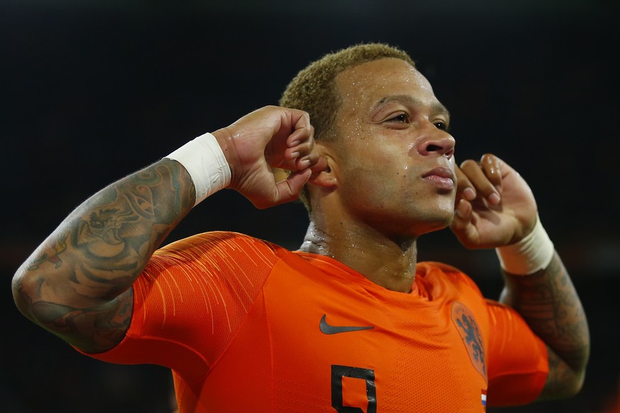 Memphis Depay of The Netherlands celebrates scoring his side&#039;s second goal during the international friendly soccer match between The Netherlands and Peru at the Johan Cruijff ArenA in Amsterdam, ...