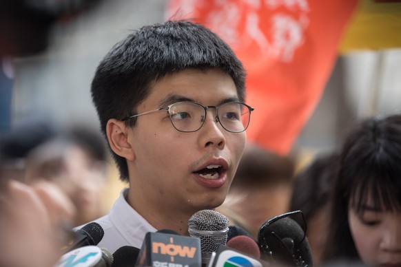 epa07653196 Demosisto Secretary General and pro-democracy activist Joshua Wong talks to the media after being released of the Lai Chi Kok Correctional Institute Hong Kong, China, 17 June 2019. Wong wa ...