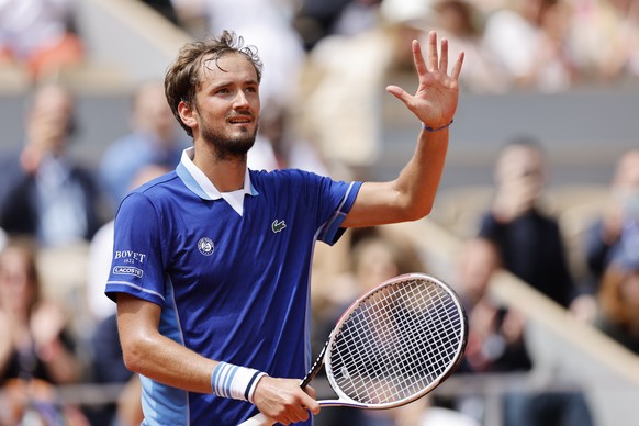 Russia's Daniil Medvedev celebrates winning his second round match against Serbia's Laslo Djere in three sets, 6-3, 6-4, 6-3, at the French Open tennis tournament in Roland Garros stadium in Paris, France, Thursday, May 26, 2022. (AP Photo/Jean-Francois Badias)