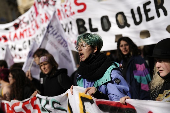 Students shout slogans during a demonstration against the government&#039;s plan to raise the retirement age to 64, in Paris Thursday, March 16, 2023. France&#039;s showdown over a bill raising the re ...