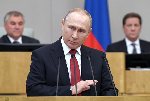 Russian President Vladimir Putin speaks during a session prior to voting for constitutional amendments at the State Duma, the Lower House of the Russian Parliament in Moscow, Russia, Tuesday, March 10 ...