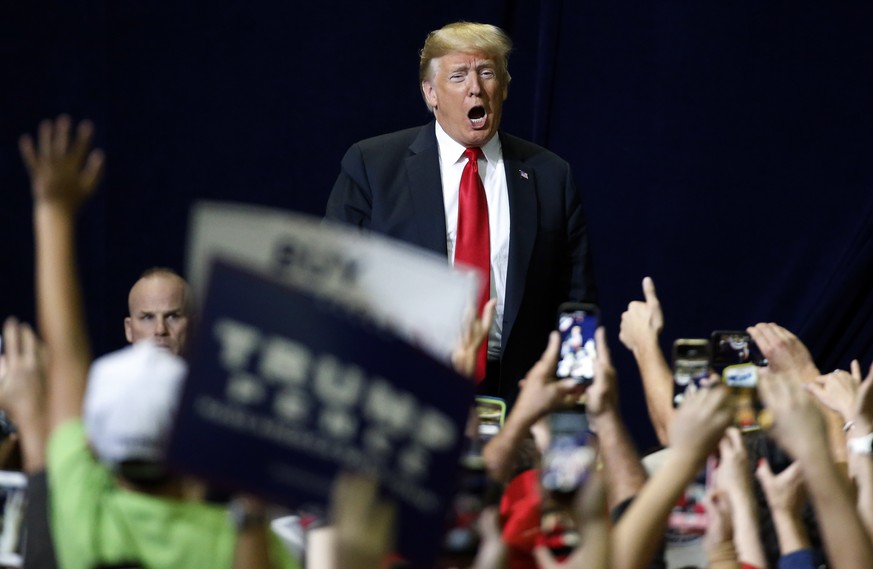 President Donald Trump reacts to the crowd&#039;s welcome at a rally Sunday, Nov. 4, 2018, in Chattanooga, Tenn. (AP Photo/Mark Humphrey)
