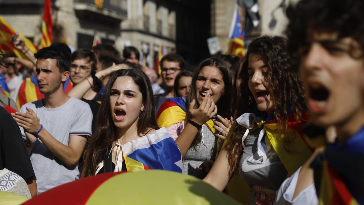 Students take part in a protest against the Spanish government announcement of implementing the article 155 in Catalonia region, in Barcelona, Spain, Thursday, Oct. 26, 2017. Catalonia's governme ...
