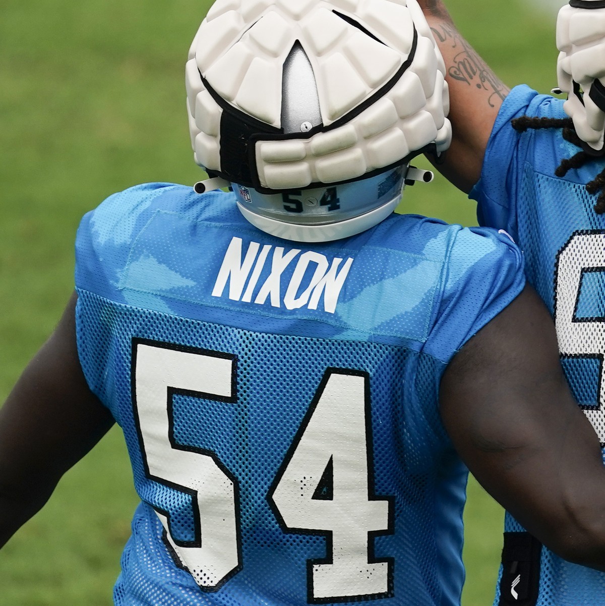 Carolina Panthers' Darryl Johnson celebrates his interception with Daviyon Nixon during the NFL football team's training camp in Gibbs Stadium at Wofford College on Saturday, July 30, 2022,  ...