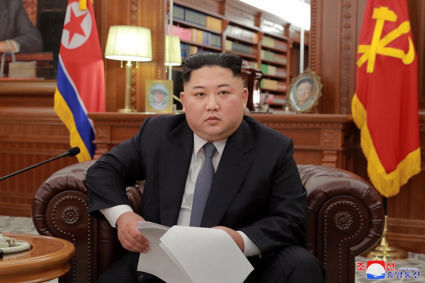 epaselect epa07256410 A photo released by the official North Korean Central News Agency (KCNA) shows North Korean Supreme Leader Kim Jong Un making an address to mark the New Year 2019 in Pyongyang, N ...