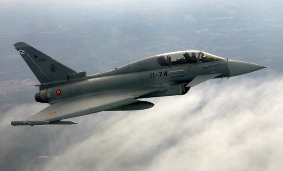 epa04246660 (FILE) A file photo dated 20 April 2007 of a Spanish Air Force Eurofighter flying over the military base of Moron de la Frontera, province of Seville, southern Spain. The pilot of a Eurofi ...