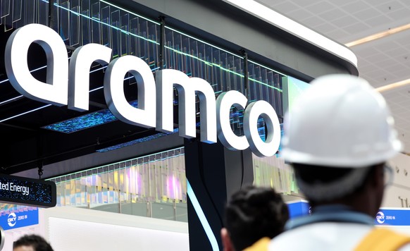epa12500188 People visit the Saudi Arabian Oil Company (Aramco) stand during the Abu Dhabi International Petroleum Exhibition and Conference (ADIPEC) in Abu Dhabi, United Arab Emirates, 03 November 20 ...