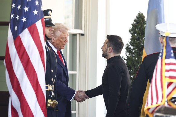epa11930616 US President Donald Trump (L) greets Ukrainian President Volodymyr Zelensky (R) outside the West Wing of the White House in Washington, DC, USA, 28 February 2025. Zelensky is in Washington ...