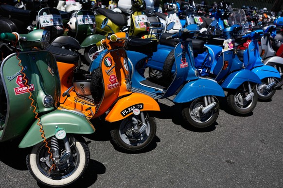 Vespa scooters are parked in front of the Vespa Village during celebrations for the 80th anniversary of the Vespa scooter in Rome, Thursday, June 25, 2026. (AP Photo/Alessandra Tarantino)
Italy Vespa  ...