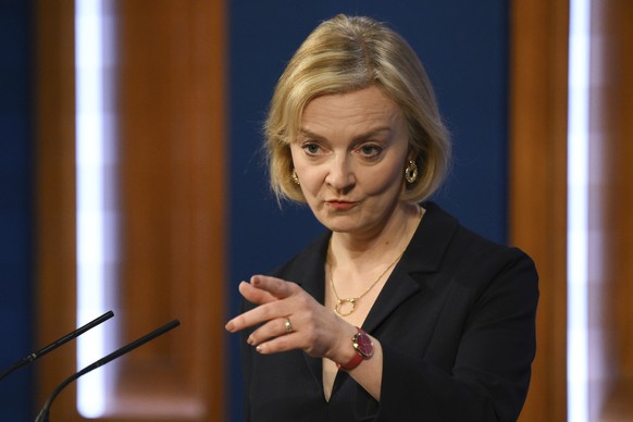 Britain&#039;s Prime Minister Liz Truss attends a press conference in the Downing Street Briefing Room in central London, Friday Oct. 14, 2022, following the sacking of the finance minister in respons ...
