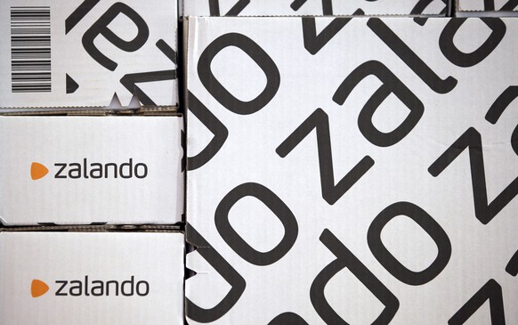 The Aug. 28, 2013 photo shows transportation boxes of the fashion retailer Zalando during a news conference in Berlin, Germany. Europe's biggest online fashion retailer, Zalando SE, says it plans a pu ...
