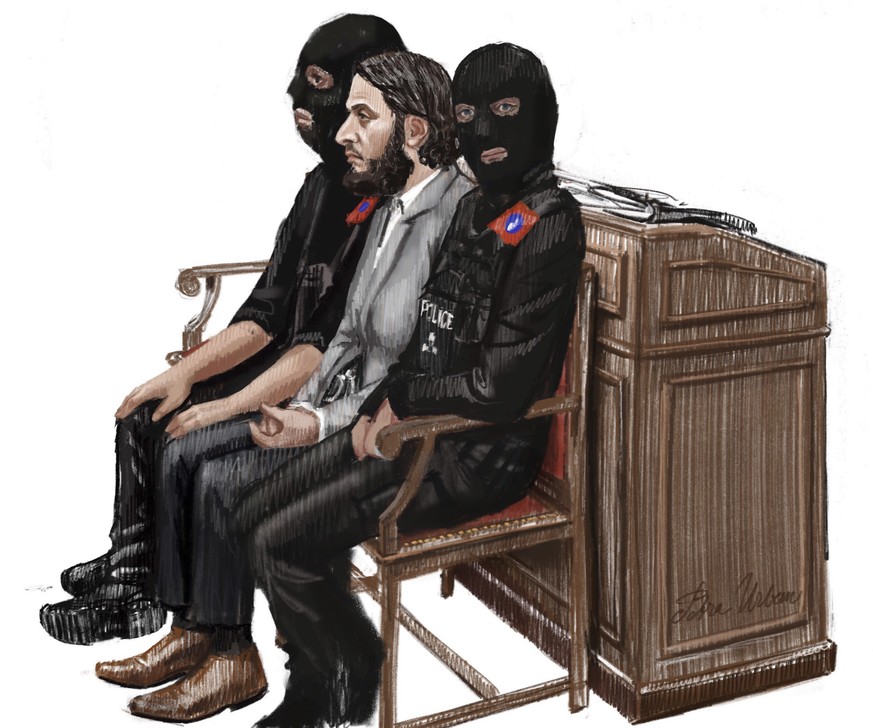 In this courtroom sketch, Salah Abdeslam, center, sits between two police officers during his trial at the Brussels Justice Palace in Brussels on Monday, Feb. 5, 2018. Salah Abdeslam and Soufiane Ayar ...