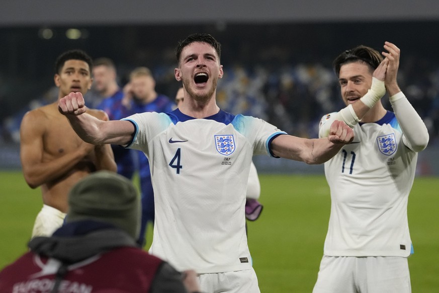 England&#039;s Declan Rice celebrates after the Euro 2024 group C qualifying soccer match between Italy and England at the Diego Armando Maradona stadium in Naples, Italy, Thursday, March 23, 2023. (A ...