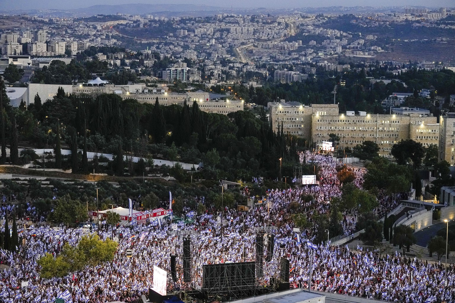 Israelis protest against Prime Minister Benjamin Netanyahu&#039;s judicial overhaul plan outside the parliament in Jerusalem, Sunday, July 23, 2023. The demonstration came a day before parliament is e ...