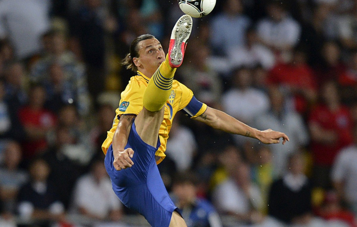 Sweden's Zlatan Ibrahimovic tries to stop the ball during the Euro 2012 soccer championship Group D match between Sweden and England in Kiev, Ukraine, Friday, June 15, 2012. (AP Photo/Martin Meis ...