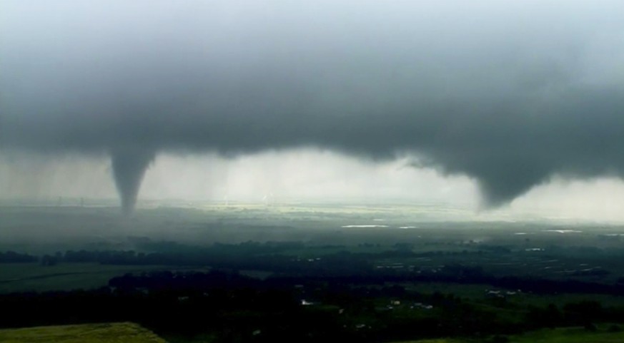 This image made from video provided by KWTV-KOTV shows two funnel clouds formed in Crescent, Okla., Monday, May 20, 2019. An intense storm system that weather forecasters labeled &quot;particularly da ...