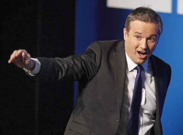 French deputy and president of conservative party Debout La Republique, Nicolas Dupont-Aignan reacts shortly before delivering his speech during an electoral meeting held in Paris, Sunday Jan. 22, 201 ...