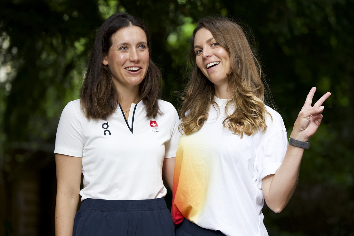 Switzerland's golf athletes Albane Valenzuela, left, and Morgane Metraux, right, pose at the Maison Suisse during a press conference at the 2024 Paris Summer Olympics in Paris, France, Sunday, Au ...