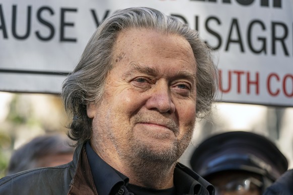 FILE - Former White House strategist Steve Bannon pauses to speak with reporters after departing federal court Nov. 15, 2021, in Washington. Several witnesses sought by the Jan. 6 committee investigat ...