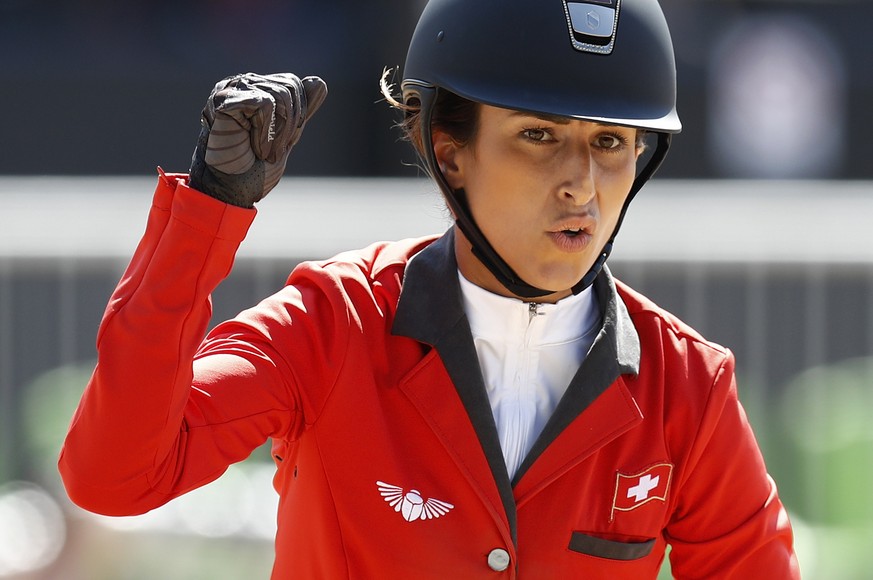 Switzerland&#039;s Janika Sprunger reacts on her horse &quot;Bonne Chance CW&quot; during the Jumping Team final of the Equestrian competition at the Olympic Equestrian Centre at the Rio 2016 Olympic  ...