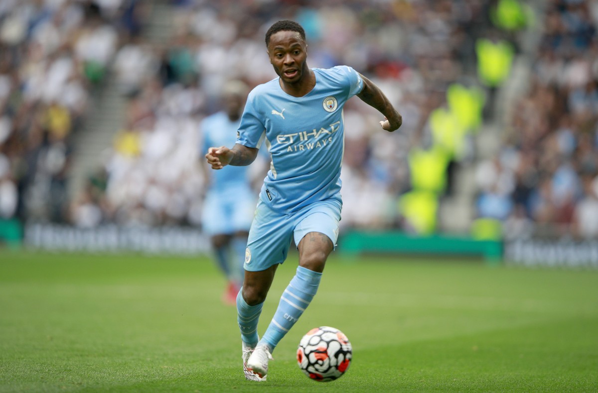 Manchester City's Raheem Sterling controls the ball during the English Premier League soccer match between Tottenham Hotspur and Manchester City at the Tottenham Hotspur Stadium in London, Sunday ...