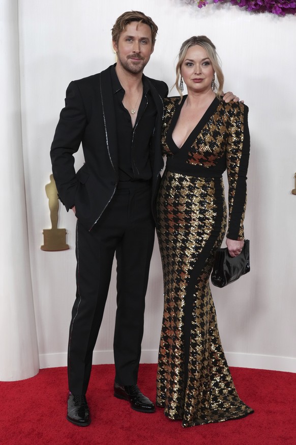 Ryan Gosling, left, and Mandi Gosling arrive at the Oscars on Sunday, March 10, 2024, at the Dolby Theatre in Los Angeles. (Photo by Jordan Strauss/Invision/AP)
Ryan Gosling,Mandi Gosling