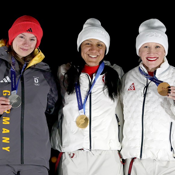 epa12748262 (from L) Silver medalist Laura Nolte of Germany, gold medalist Elana Meyers Taylor of the USA and bronze medalist Kaillie Armbruster Humphries of the USA pose with their medals during the  ...
