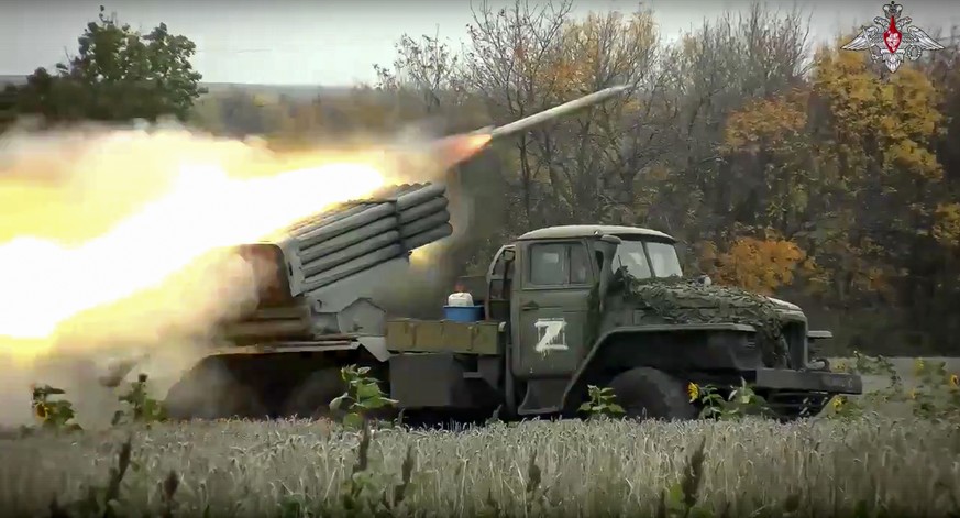 This handout photo taken from video released by Russian Defense Ministry Press Service Tuesday, Oct. 4, 2022, shows the Russian military&#039;s Grad multiple rocket launcher firing rockets at Ukrainia ...