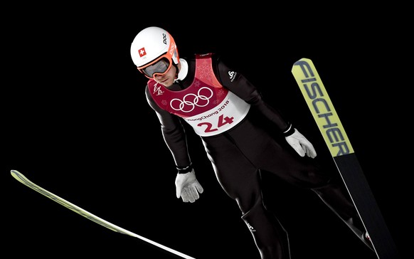 epa06545477 Tim Hug of Switzerland in action during the Ski Jumping portion of the Nordic Combined Individual Large Hill / 10 km competition at the Alpensia Ski Jumping Centre during the PyeongChang 2 ...