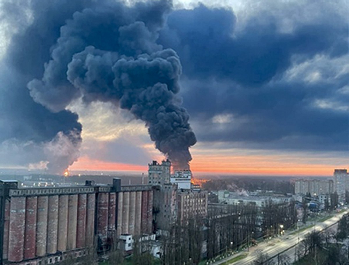 In this photo taken by an anonymous source, smoke rises from oil storage facilities hit by fire in Bryansk, Russia, Monday, April 25, 2022. The Emergencies Ministry said the massive fire at the depot  ...
