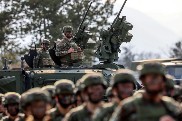 epa12792407 Soldiers of the Light Infantry Battalion Group (LIBG) prepare for the visit of NATO Secretary General Mark Rutte (not on the picture) at the Ilinden Barracks in Skopje, North Macedonia, 03 ...