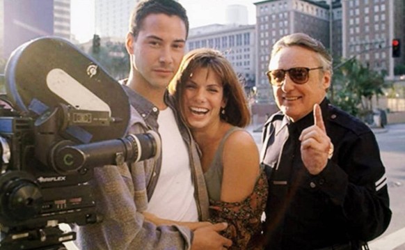 Keanu Reeves, Sandra Bullock &amp; Dennis Hopper on the set of Speed in (1993)

https://www.facebook.com/FarOutCinema/photos/486743876376334