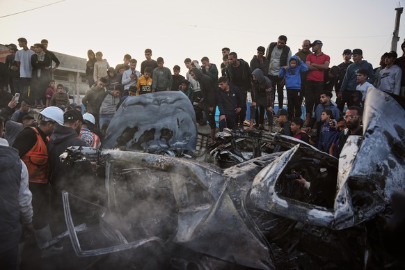 Palestinians inspect a vehicle struck by an Israeli airstrike in the Maghazi refugee camp in the central Gaza Strip, Saturday, April 4, 2026. (AP Photo/Abdel Kareem Hana)
Israel Palestinians Gaza