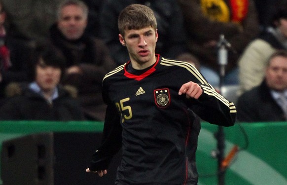 MUNICH, GERMANY - MARCH 03: Thomas Mueller of Germany runs with the ball during the International Friendly match between Germany and Argentina at the Allianz Arena on March 3, 2010 in Munich, Germany. ...